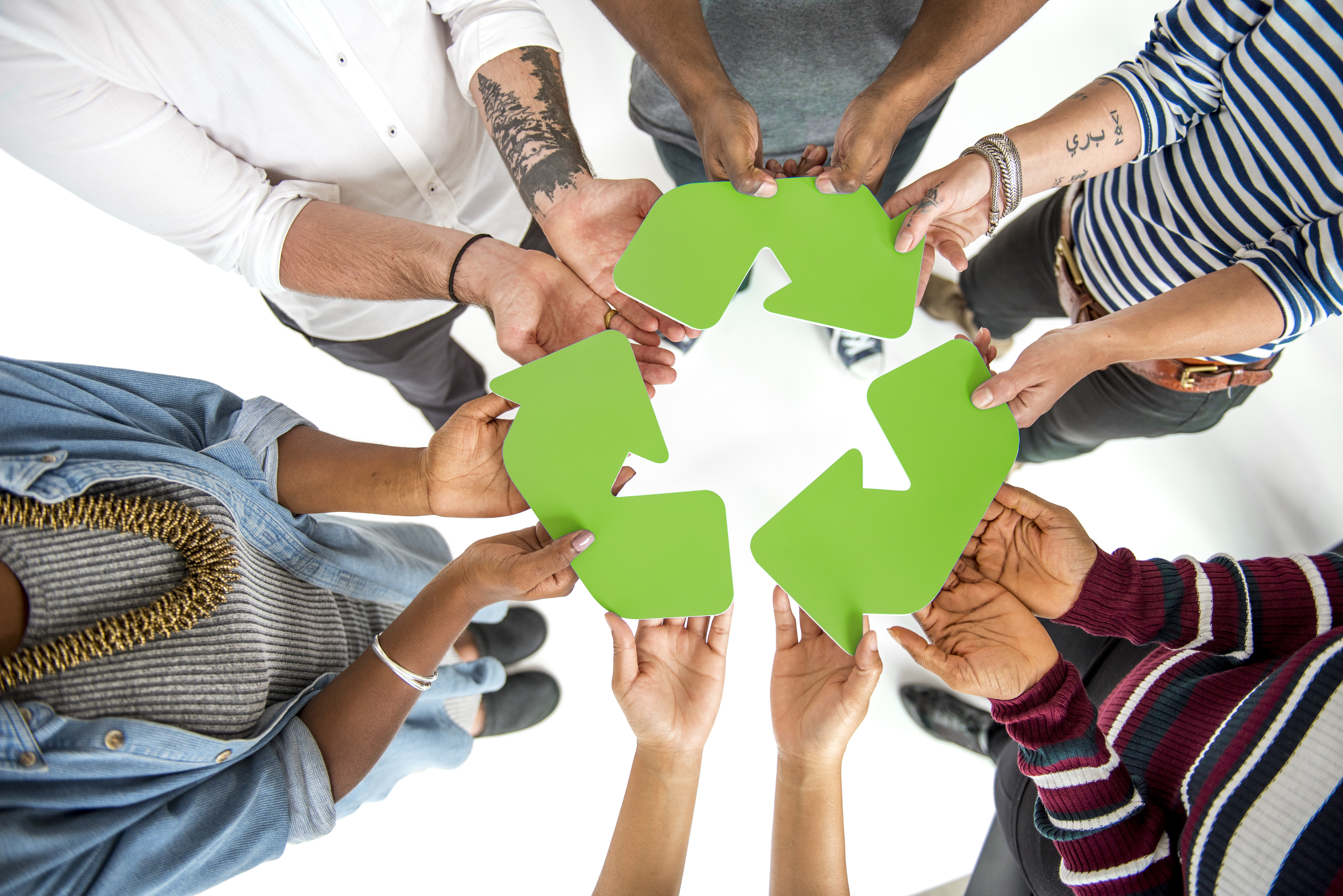 Group of People Holding Recycling Sign Concept